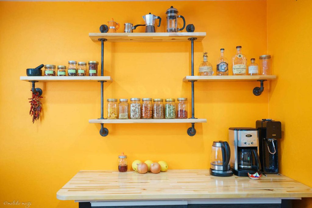 floating kitchen shelves with pipe